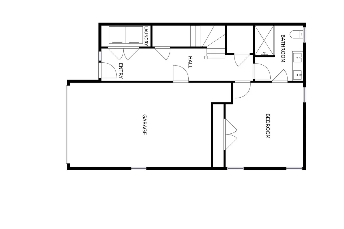 This interior image captures the garage, entry, bedroom, bathroom, and laundry area. The garage and entry are prominent, showcasing a spacious and practical arrival point with direct access to household amenities.